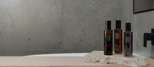 Scarlet & Grace premium room spray bottles on stone surface — natural Australian home fragrance