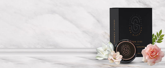 Scarlet and Grace natural car diffuser clipped to a vent for long-lasting fragrance