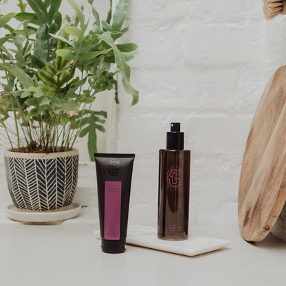 Scarlet & Grace 200ml Black Raspberry & Vanilla room spray styled with matching hand cream and fresh greenery

